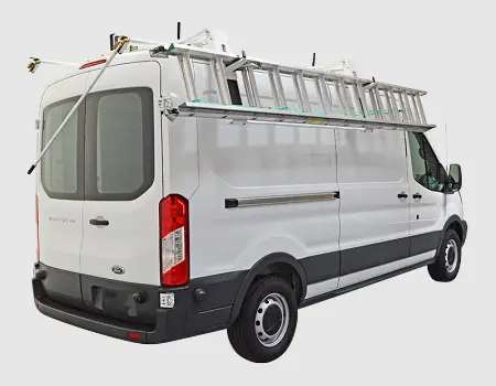 Holman drop-down ladder rack lowered beside a Ford Transit van